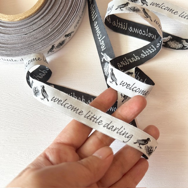 5/8"-Black On White Welcome Little Darling Novelty Jacquard Ribbon - Image 3