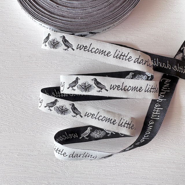 5/8"-Black On White Welcome Little Darling Novelty Jacquard Ribbon
