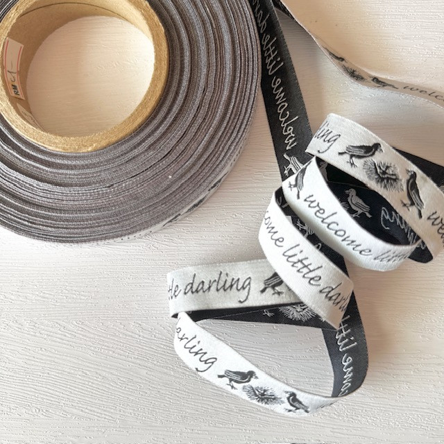 5/8"-Black On White Welcome Little Darling Novelty Jacquard Ribbon - Image 5