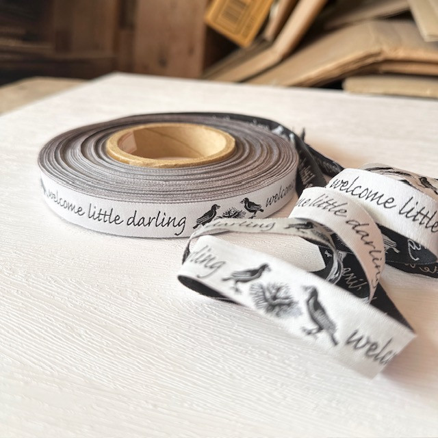 5/8"-Black On White Welcome Little Darling Novelty Jacquard Ribbon - Image 4